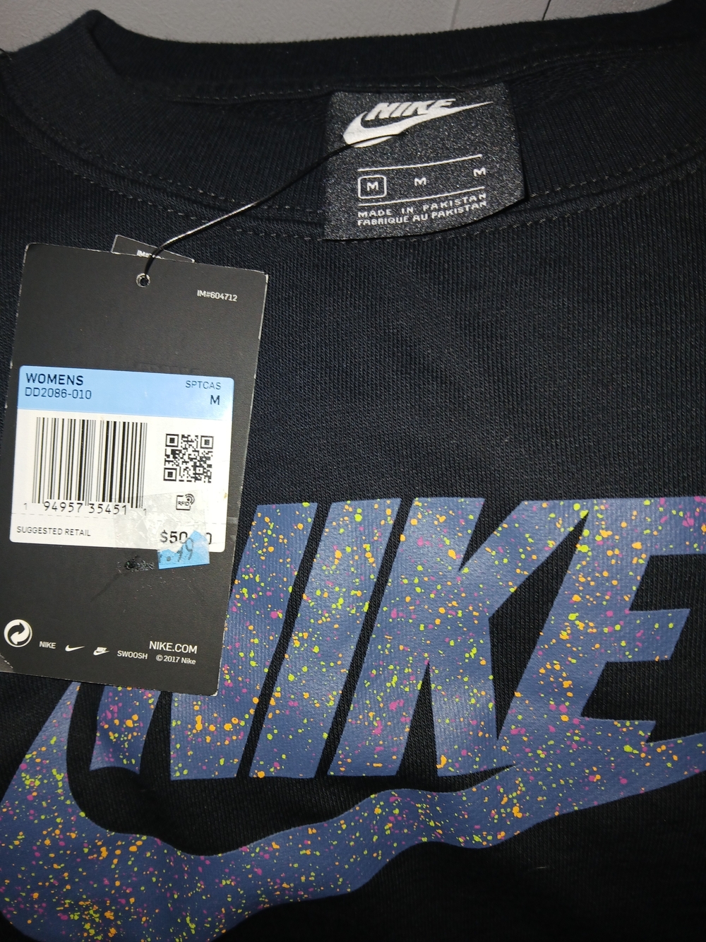 Nike Women's Black Crop Top with Multicolor Speckled Logo